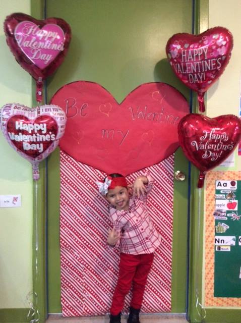 Child in Front of Door with Valentine
